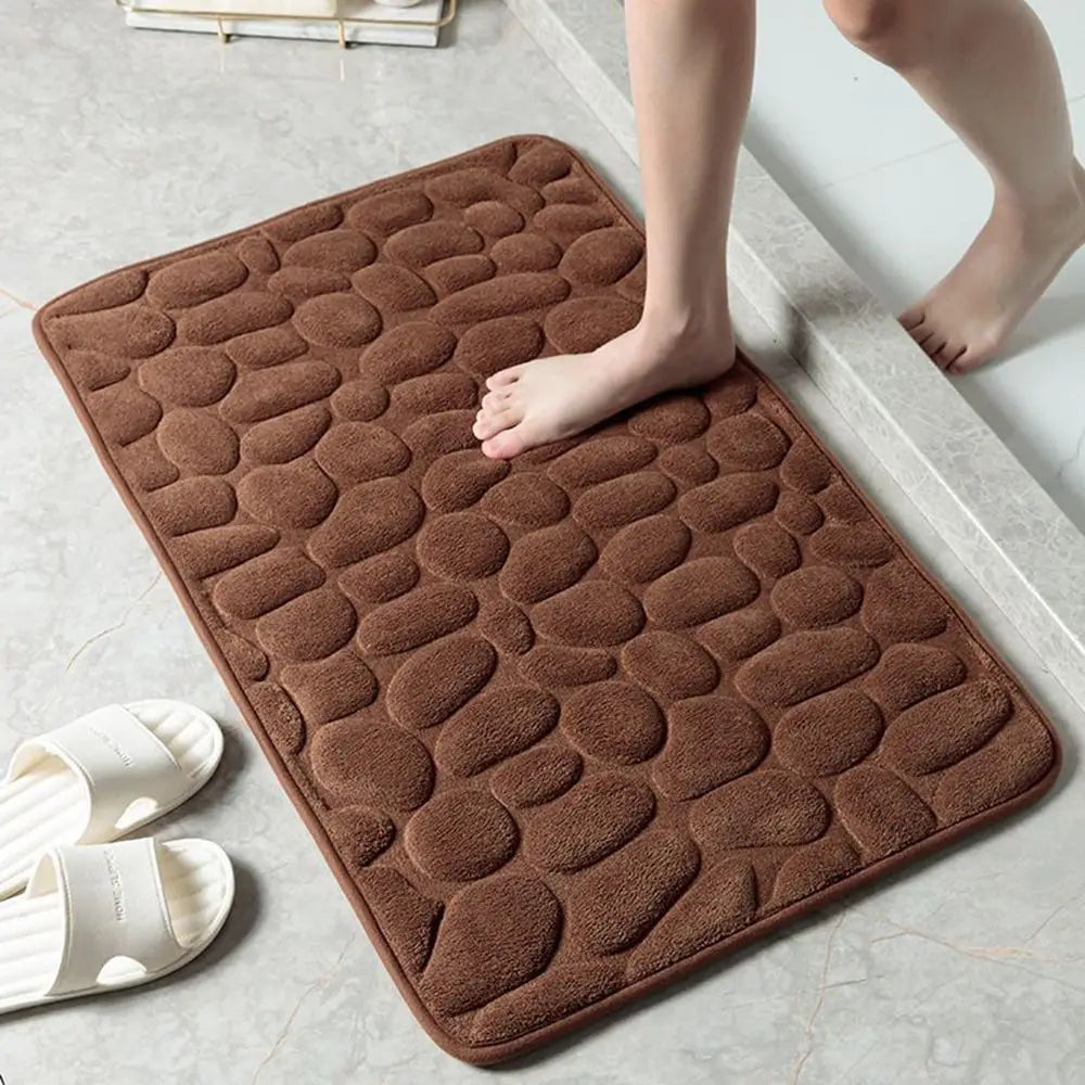 Cobblestone shower door mat